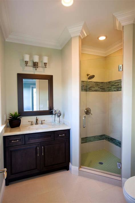 This Simple Guest Bathroom Features A Walk In Shower And Dark Brown