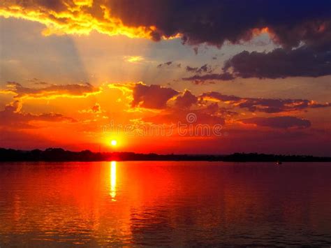 Last Rays Of Orange Sunset Sky Over Waterriver Stock Photo Image Of