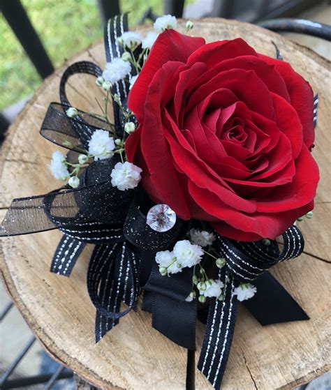 Check spelling or type a new query. Red Rose with Black Ribbon Wrist Corsage in Murfreesboro ...