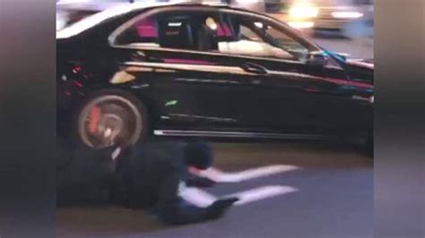 dramatic video shows cop getting hit by driver then chasing car on foot youtube
