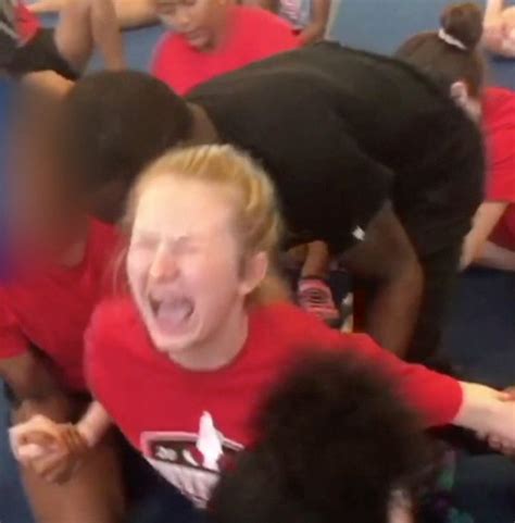video shows high school cheerleader crying as coach forces her into splits huffpost uk crime