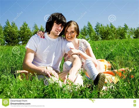 Beautiful Girl And Boy On Grass Stock Photo Image Of Lifestyles