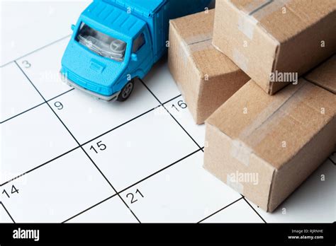 Moving Day Calendar For Note With Cardboard Boxes And Truck Stock