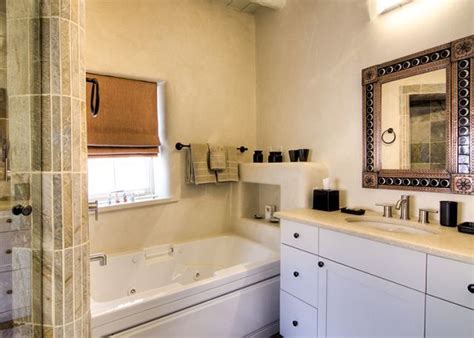 Bathroom had a bath with a shower and a separate shower. Spa bath with stone faced shower and Jacuzzi tub | Jacuzzi ...