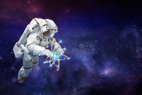 Spaceman And Pure Energy Spacemission In Outer Space Stock Photo