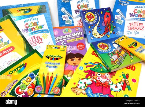 Coloured Paper Colouring Books And Pencils Stock Photo Alamy