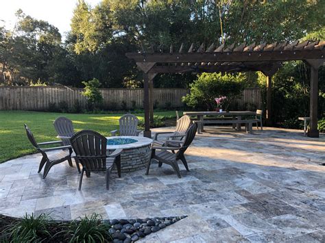 Travertine Tiled Outdoor Sitting Area With Custom Pergola