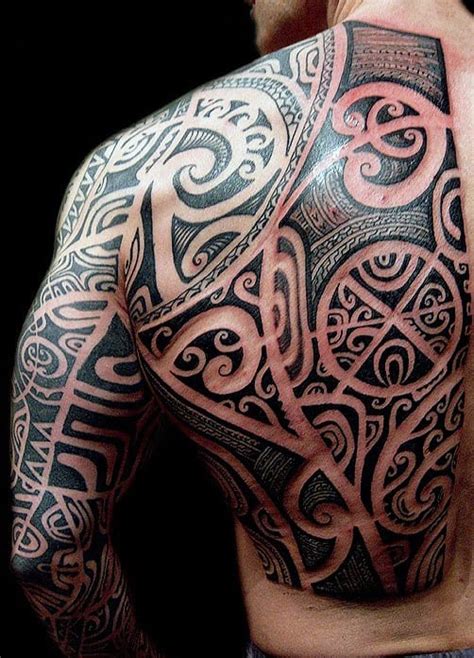This is a perfect canvas for the masters and lovers of large, complex compositions. 60 Tribal Back Tattoos For Men - Bold Masculine Designs