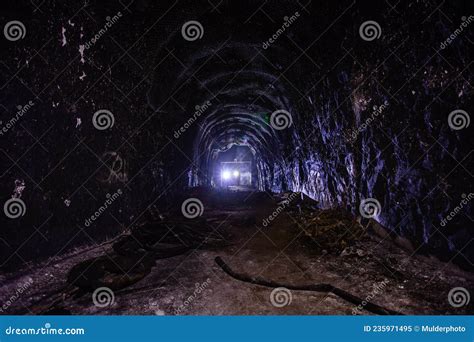 Dark Creepy Abandoned Coal Mine in Backlight Stock Image - Image of