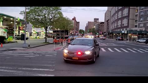 Nypd Anticrime Responding On A Sidewalk And Against Traffic On