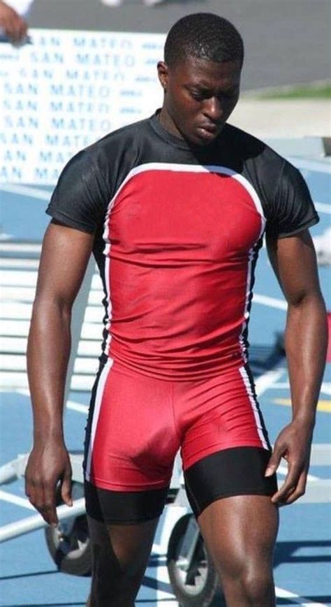 Sporty And Stylish Black Athlete In Red And Black Wrestling Suit