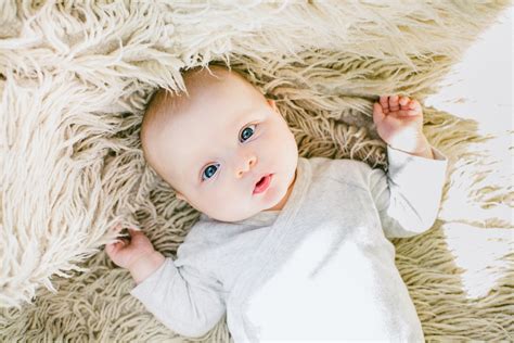 Baby In White Onesie · Free Stock Photo