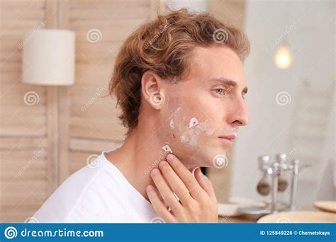 Young Man With Face Hurt While Shaving Stock Photo Image Of Blade