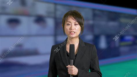 Breaking news, features, analysis and special reports plus audio and video from across the asian continent. Serious Asian Chinese News Presenter With Grid Of TVs ...