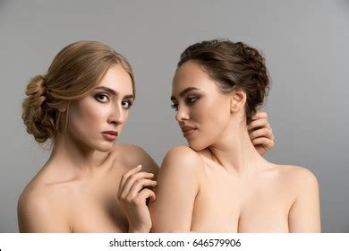 Two Models Topless Posing Together Studio Stock Photo
