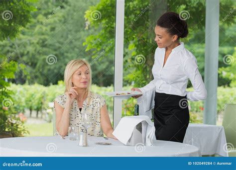 Waitress Serving Customer With Food Stock Photo Image Of Restaurant