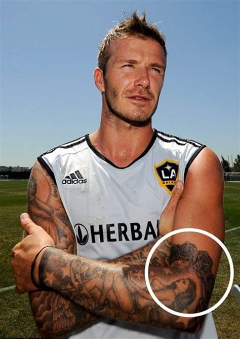 David Bekhams Tattoo Design And Meaning David Beckham And Football