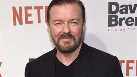 Ricky Gervais Unrecognisable With Spiky Hair And Earrings As Footage Of