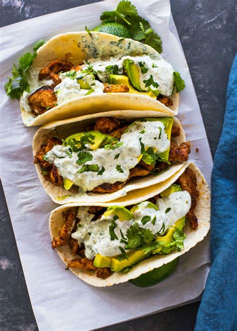 Spicy pan grilled chicken and avocado tacos topped with a creamy cilantro lime sauce. Chicken and Avocado Tacos with Creamy Cilantro Sauce ...