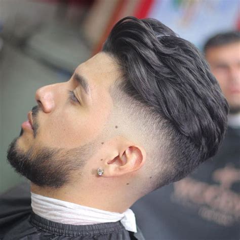 The fade haircut is the most popular and best way for men to cut their hair short on the sides and back. Top Men's Hair Trends 2018