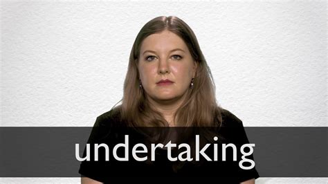 How To Pronounce Undertaking In British English Youtube