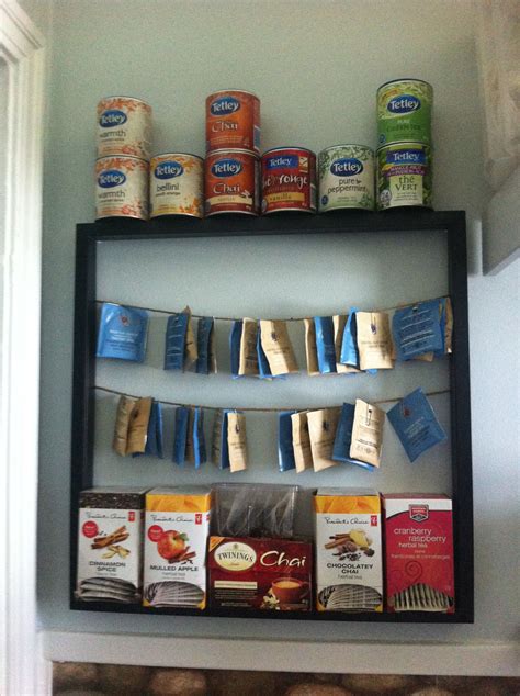 I couldn't find one tea organizer that would do what i needed, fit my cupboard space, and fit my budget. Easy tea storage from an old frame | Tea storage, Diy storage, Organization station