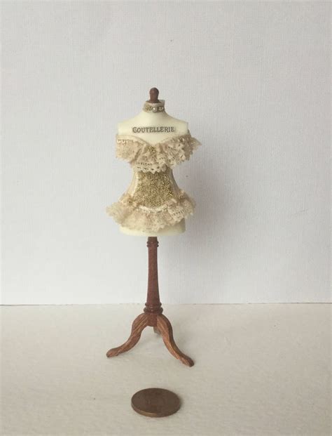 handmade 1 12 scale dollhouse miniature ladies shop gold bead detail cream lace miniature corset