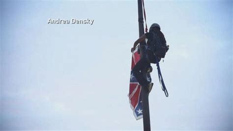 video woman climbs flagpole takes down confederate flag abc news