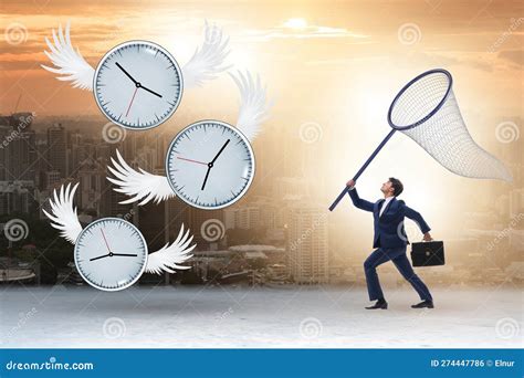 Deadline Concept With Businessman Catching Clocks Stock Photo Image