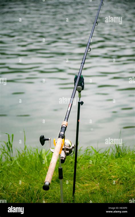 Baited Fishing Rod On A River Bank Stock Photo Alamy