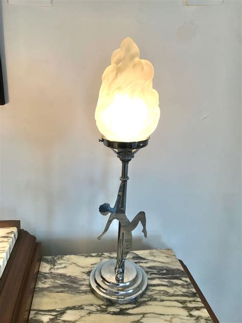 Art Deco English Chrome Figural Lady Lamp With A Flame Shade Artedeco