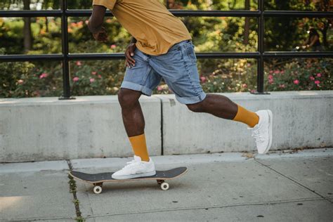 African American Skater Riding Skateboard On Street In Daytime · Free