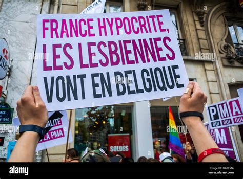 paris france lgbt groups protesting in annual gay pride march french sign france hypocrite