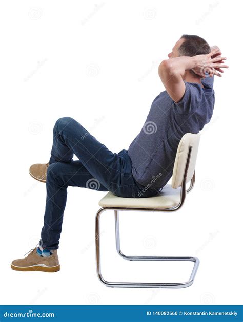 Side View Of A Man Sitting On A Chair Stock Photo Image Of Cellar