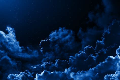 Mystical Midnight Sky With Stars Surrounded By Dramatic Clouds Dark