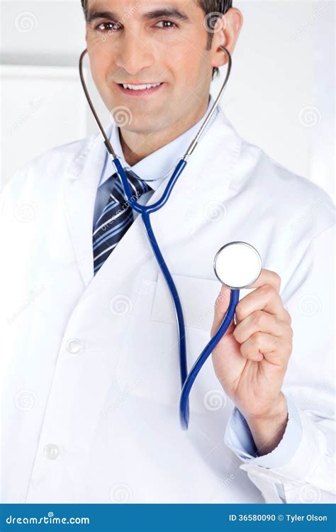 Male Doctor Holding Stethoscope Stock Photo Image Of Happy Adult