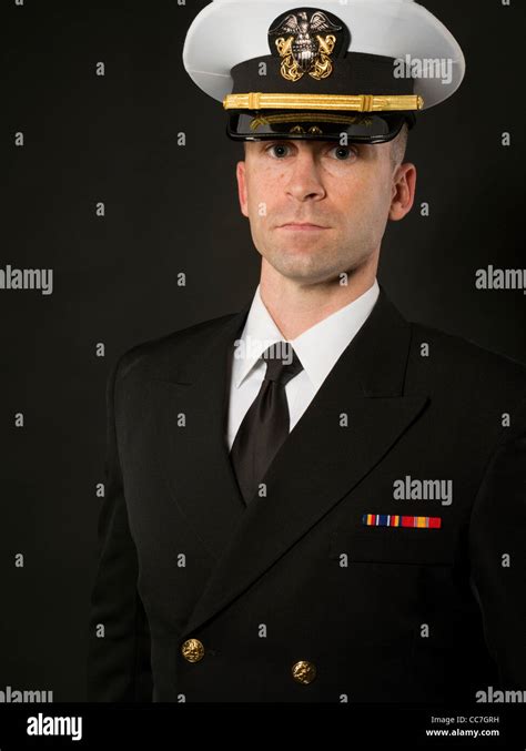 United States Navy Officer In Service Dress Blues Uniform With