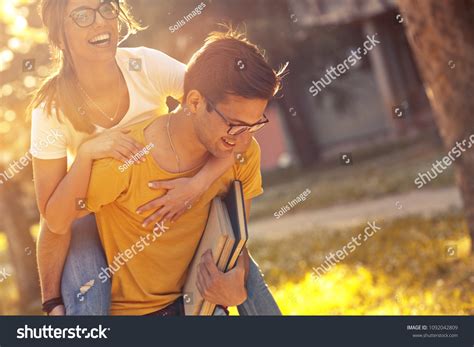 Young Student Couple Making Fun Campus Stock Photo 1092042809