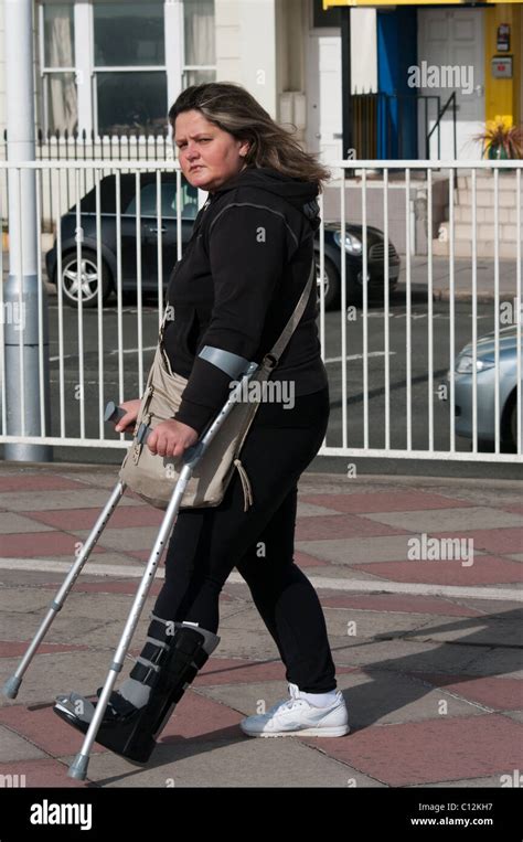 Woman On Crutches Stock Photo Royalty Free Image 35094675 Alamy