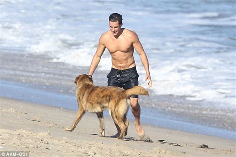 Orlando Bloom Hits The Beach But Manages To Keep His Pants