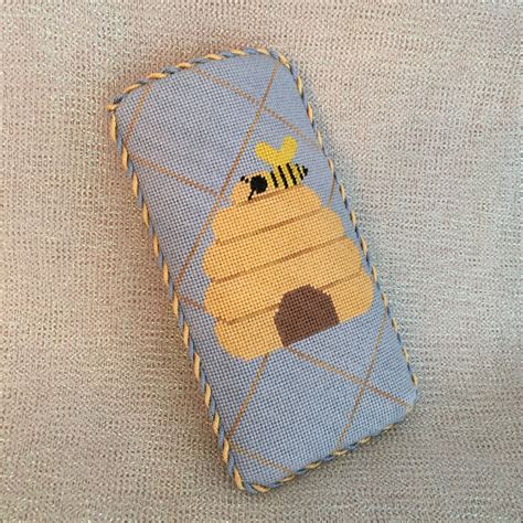 Needlpoint bee themed eyeglass case | Needlepoint designs, Eyeglass