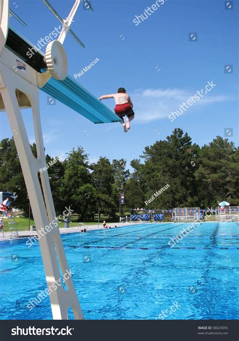 Boy Jumping Off High Diving Board Stock Photo 58023055 Shutterstock