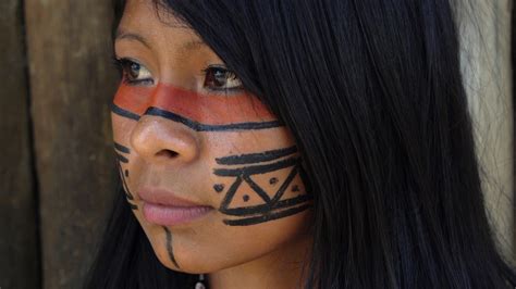 closeup face of native brazilian woman at an indigenous tribe in the amazon inlingua international