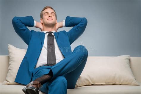 Handsome Businessman Relaxing On The Sofa Stock Image Image Of
