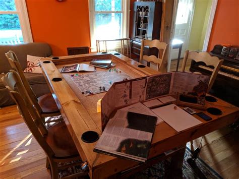 This gaming table is divided into a wooden base for the tv, table extension, six table legs and the surface mat. 20 DIY Game Table Ideas - Love Games?