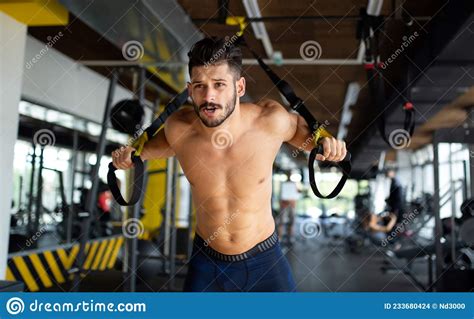 Young Fit Man Exercising In A Gym Sport People Healthy Lifestyle