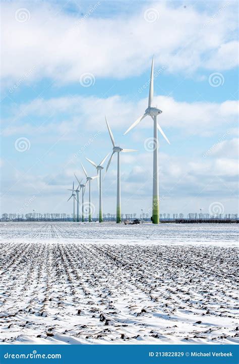 Windmills In The Snowy Landscape Of Flevoland Stock Image Image Of