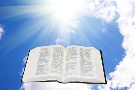 Holy Bible In The Sky Illuminated By A Sunlight Stock Image Image