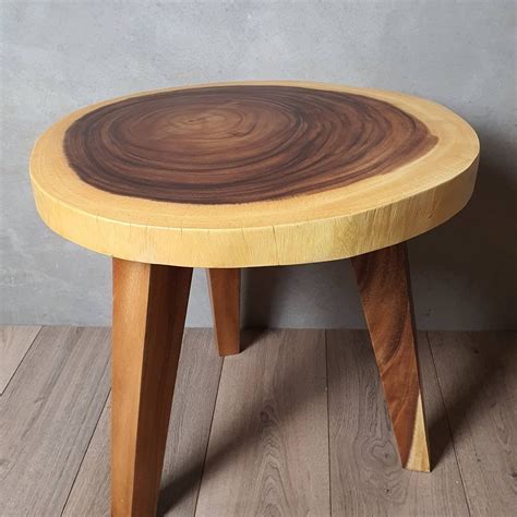 For sale selling a beautiful, finished on one side, live edge slab that was previously a coffee table. Round Raintree Wood Live Edge Coffee Table 70cm Diameter