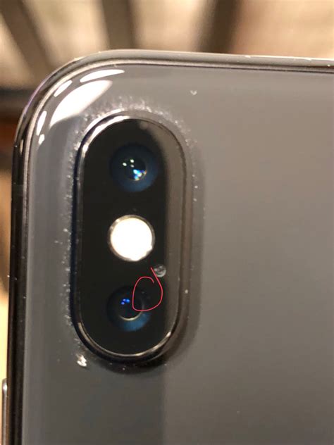 Speck of dust in iPhone X camera lens | MacRumors Forums